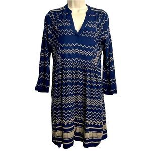 Holding Horses Anthropologie Navy and tan graphic print long sleeve dress